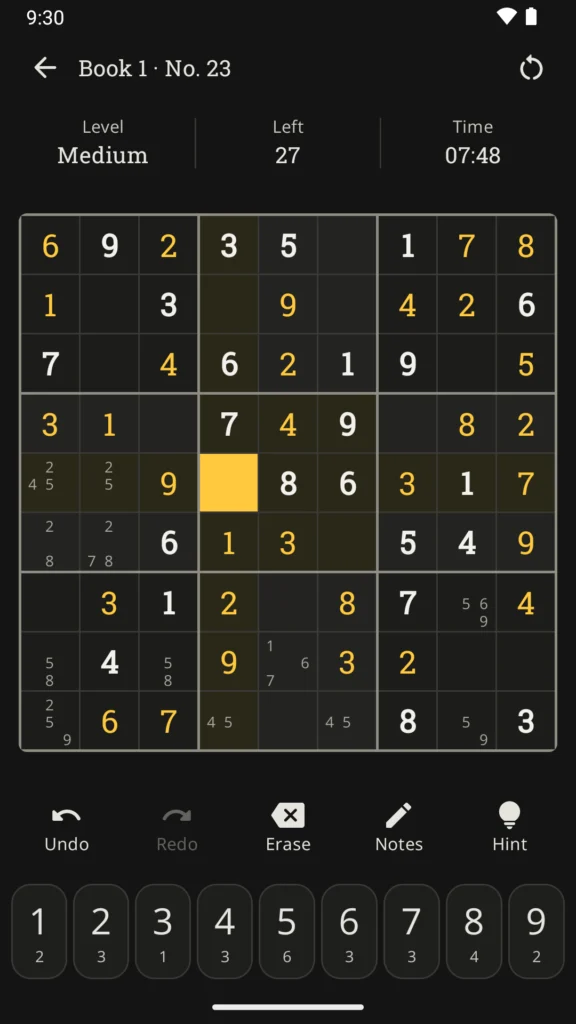 The puzzle screen in dark mode, with yellow digits on graphite